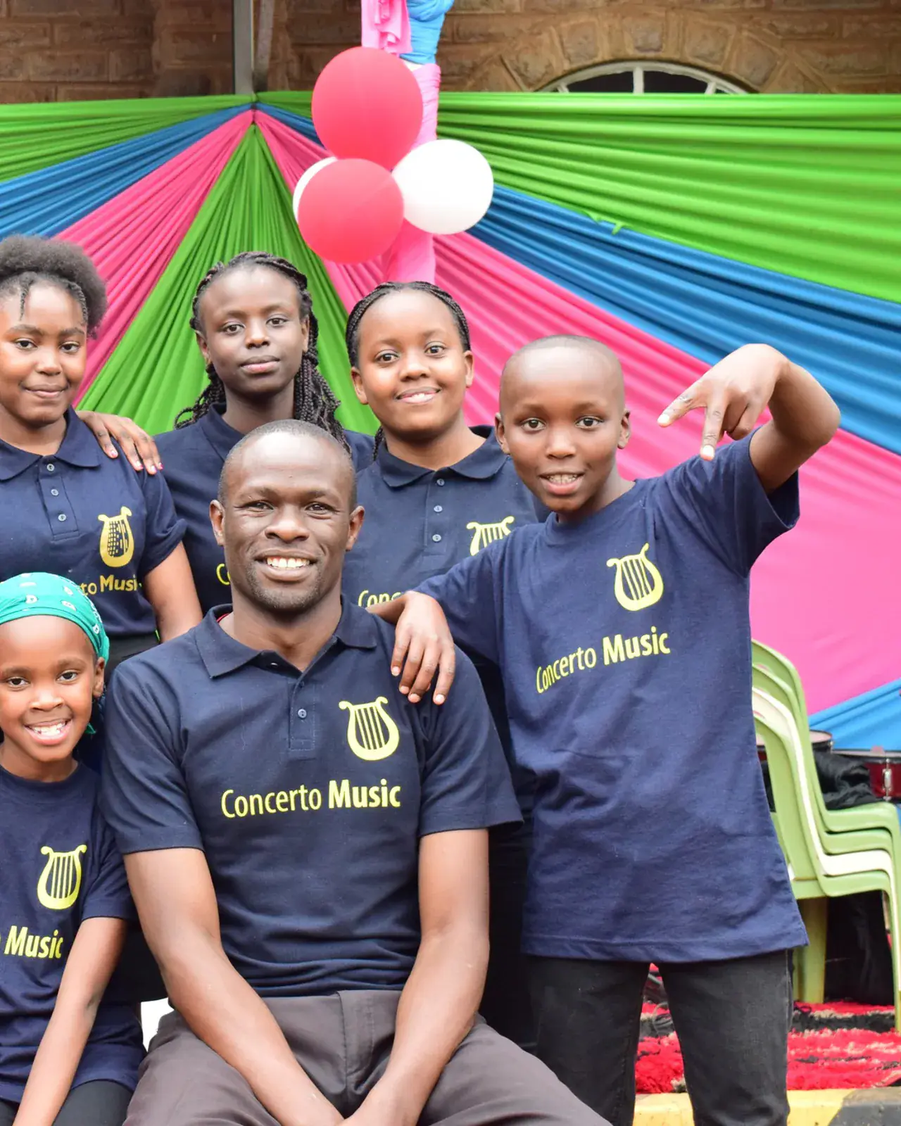 Concerto Music Place students gathered together — community at our Kikuyu studio