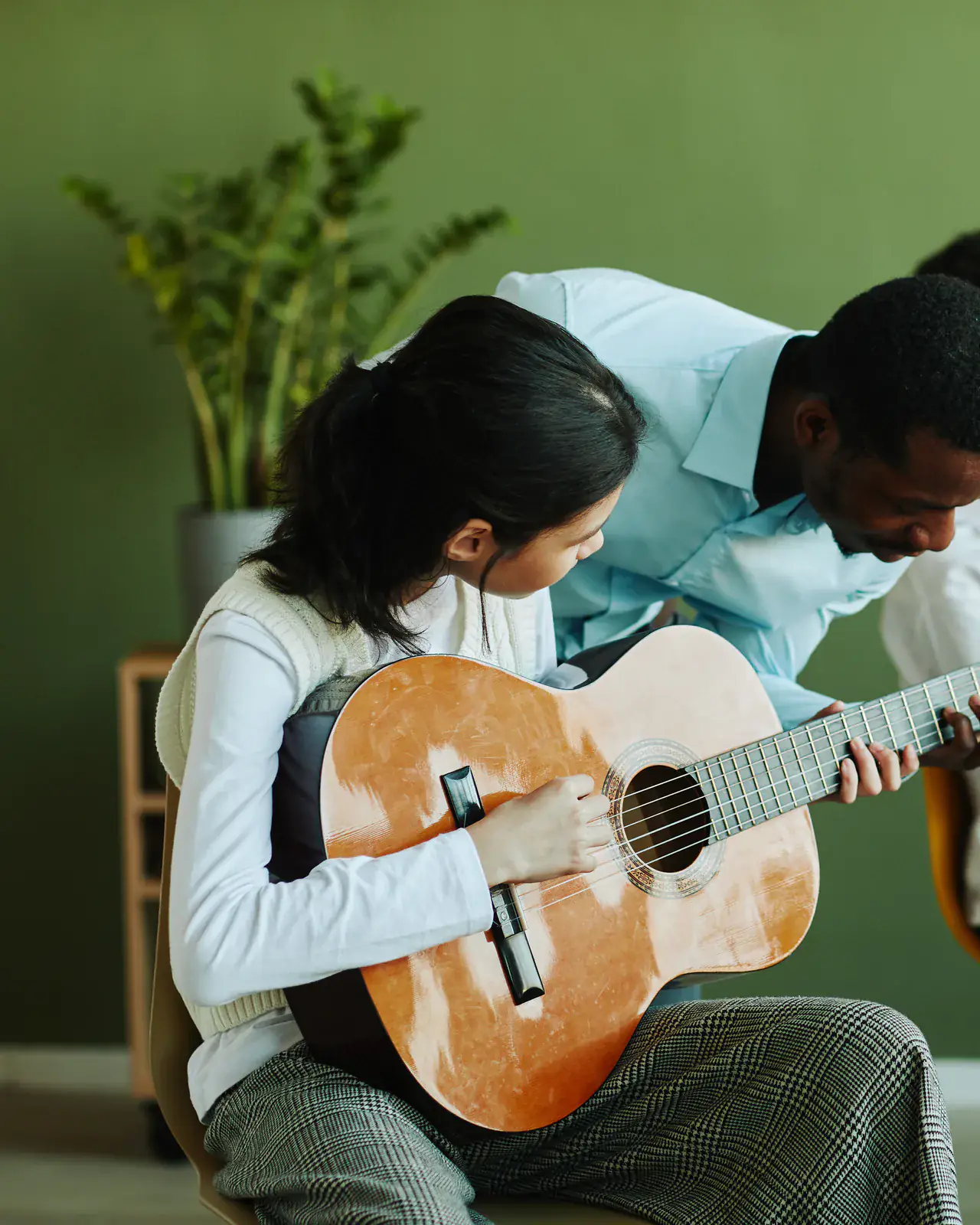 Teenagers practising music in a relaxed classroom — CBC music training by Concerto Music Place