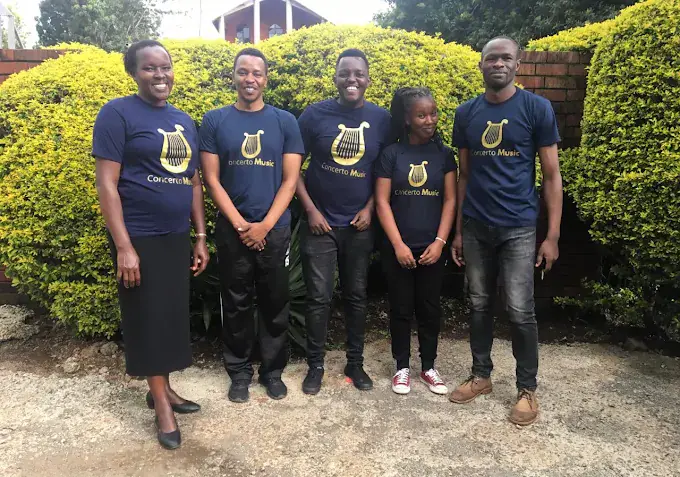 The Concerto Music Place team in branded tees outside the Kikuyu studio
