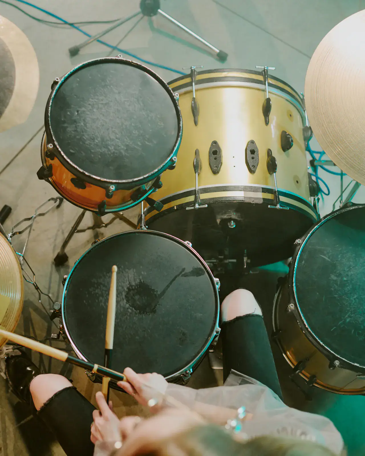 Drummer on stage with sticks raised — drum kit lessons at Concerto Music Place, Kikuyu