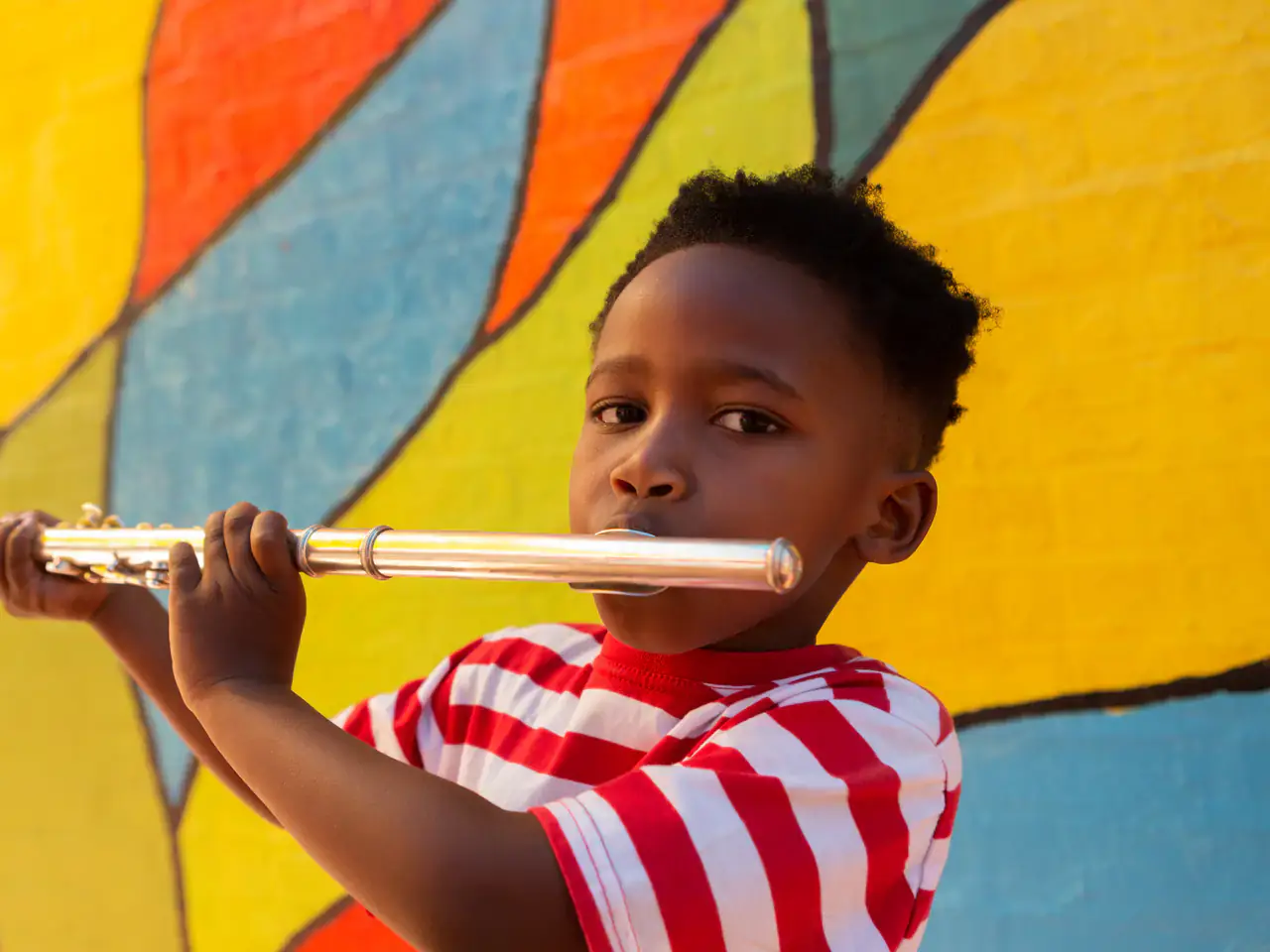 A young student playing the flute — flute lessons at Concerto Music Place, Kikuyu