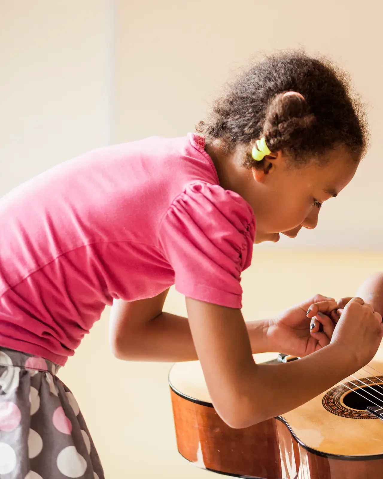 Children learning guitar at home — in-home music lessons in Kileleshwa, Nairobi