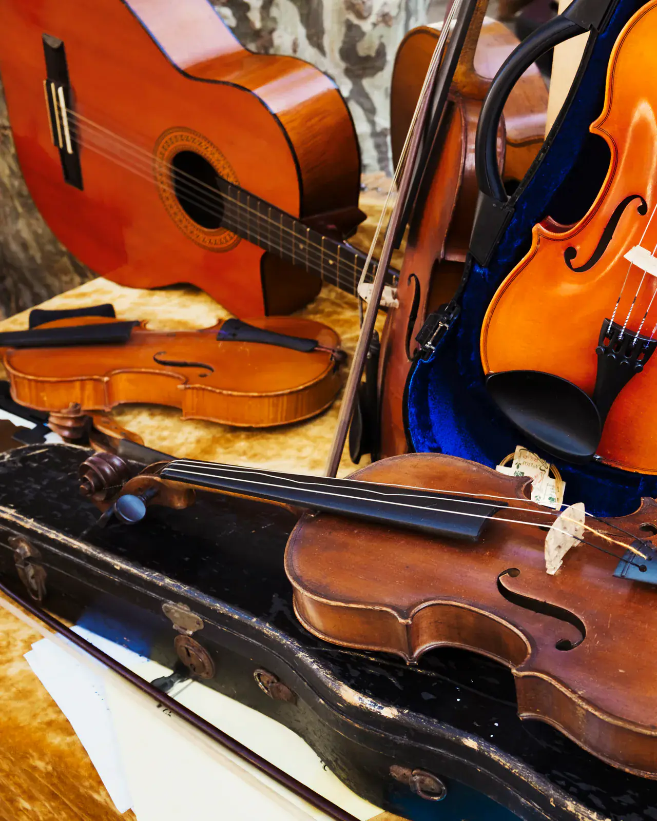 Display of violins and guitars in a music shop — musical instruments for sale in Kenya