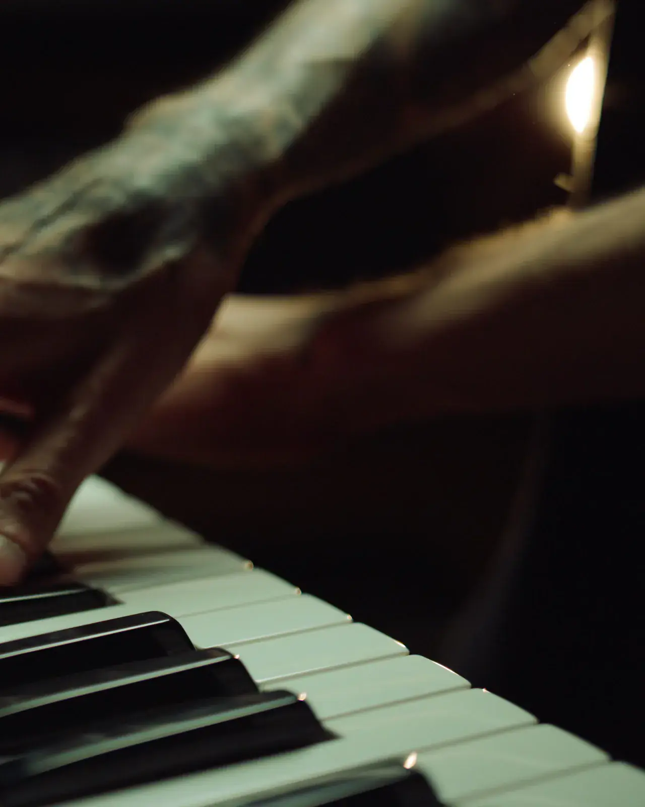 Hands at the piano in a recording studio — private one-to-one music lessons at Concerto Music Place