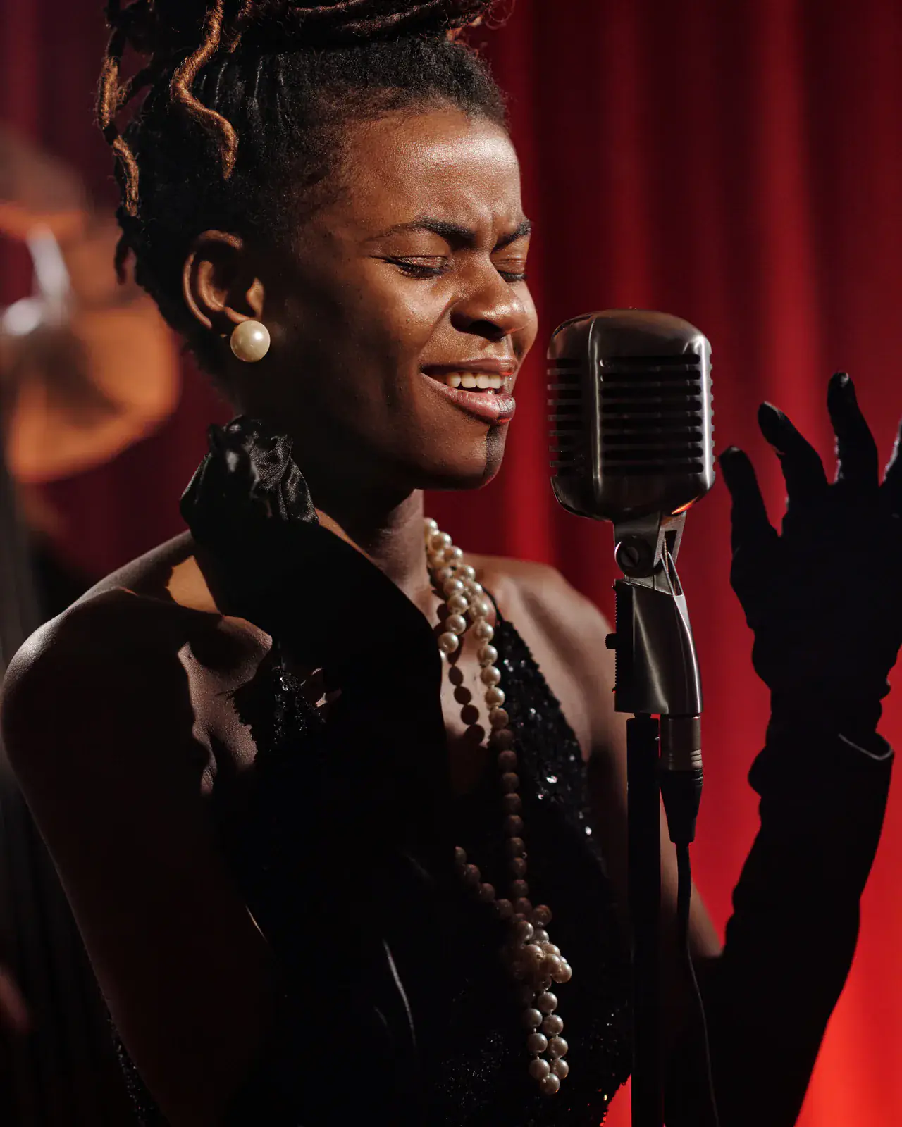 Elegant vocalist at a classic microphone — voice lessons at Concerto Music Place, Kikuyu